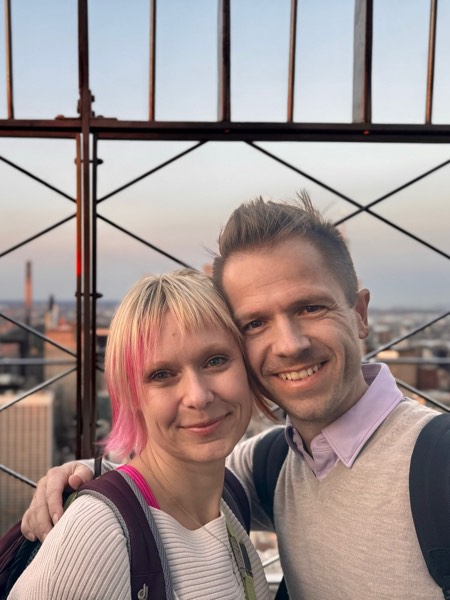 Isabell and Sven Haase on a rooftop above the New York skyline